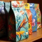 colorful-floral-tea-packaging-wooden-shelf